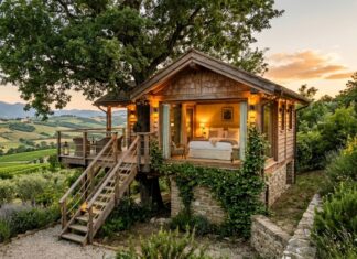 Casa sull’albero in Italia: le 20 migliori strutture dove dormire Casa sull'albero in Italia immersa nella natura con colline sullo sfondo