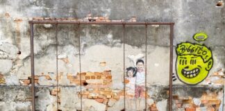 George Town, Penang: la perla multiculturale del Nord Malesia che non ti aspetti murales di due bambini su un' altalena a george town penang malesia