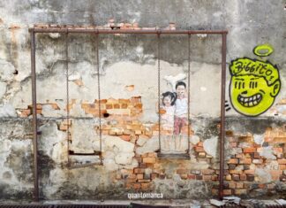 George Town, Penang: la perla multiculturale del Nord Malesia che non ti aspetti murales di due bambini su un' altalena a george town penang malesia