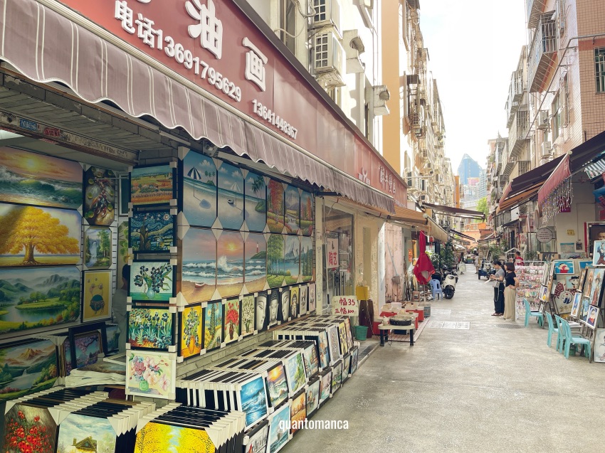 Dafen Oil Painting Village a Shenzhen con artisti al lavoro e gallerie d’arte